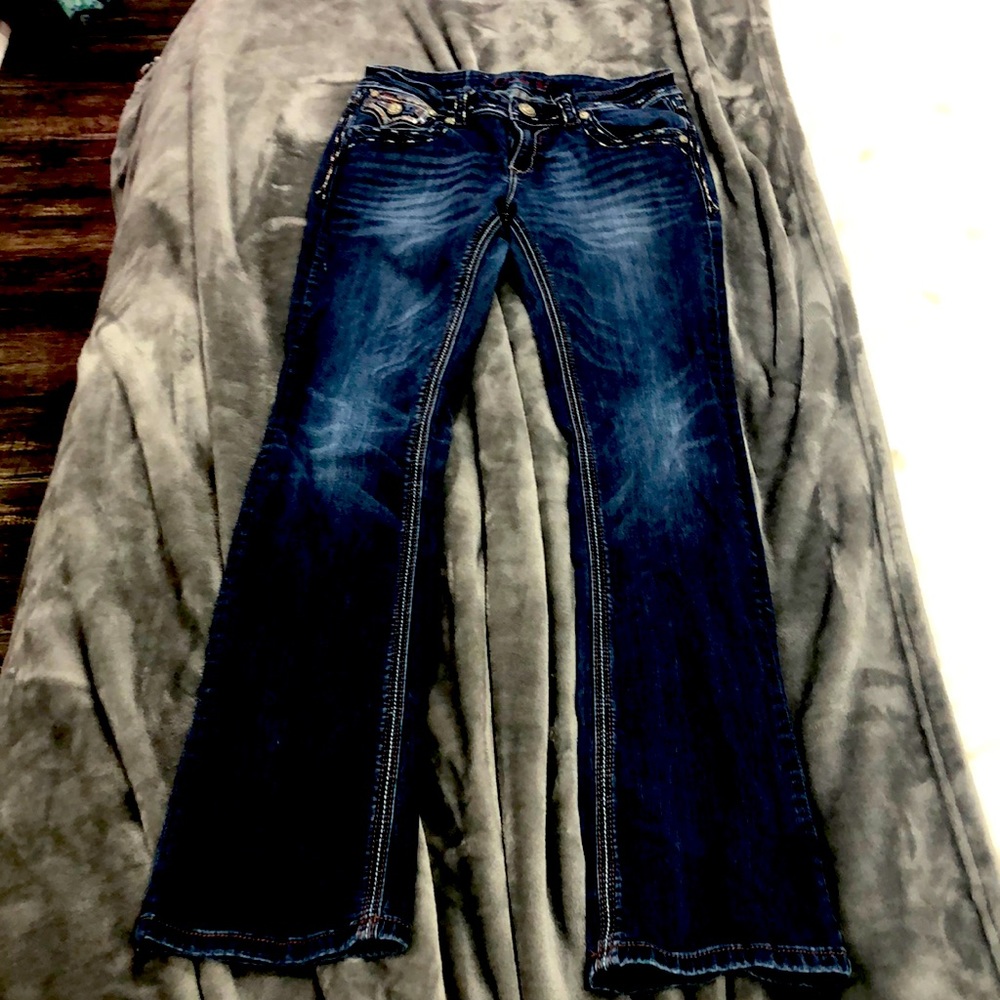 dark colored boot cut jeans
